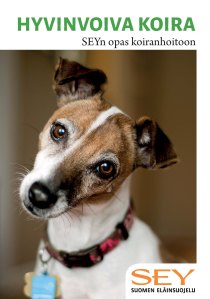 Koiraoppaan kansi jossa koira katsoo kameraan pää kallellaan